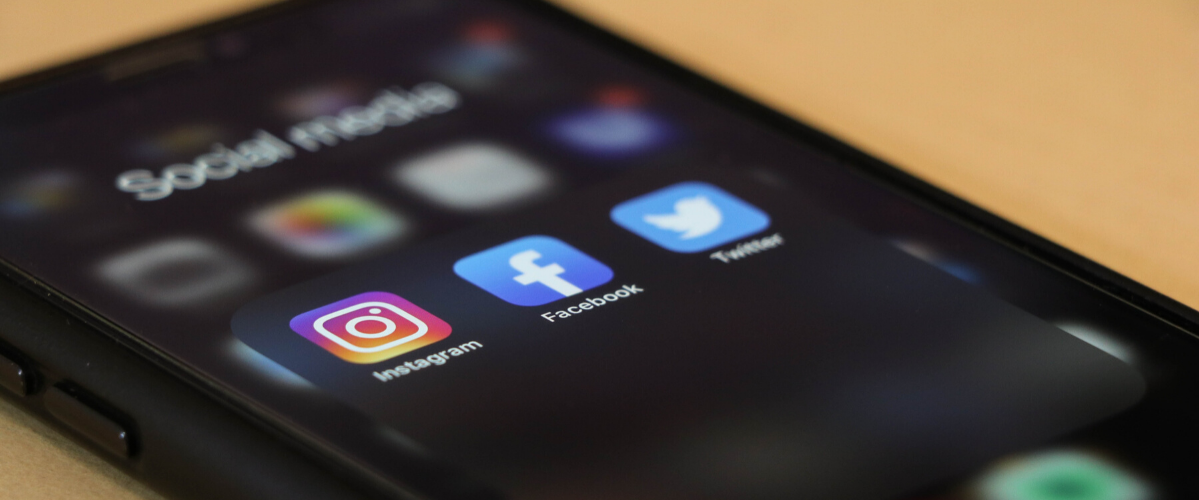 a phone displaying social media apps